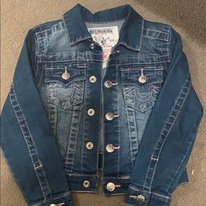 Girls Denim jacket. Medium-dark wash denim color